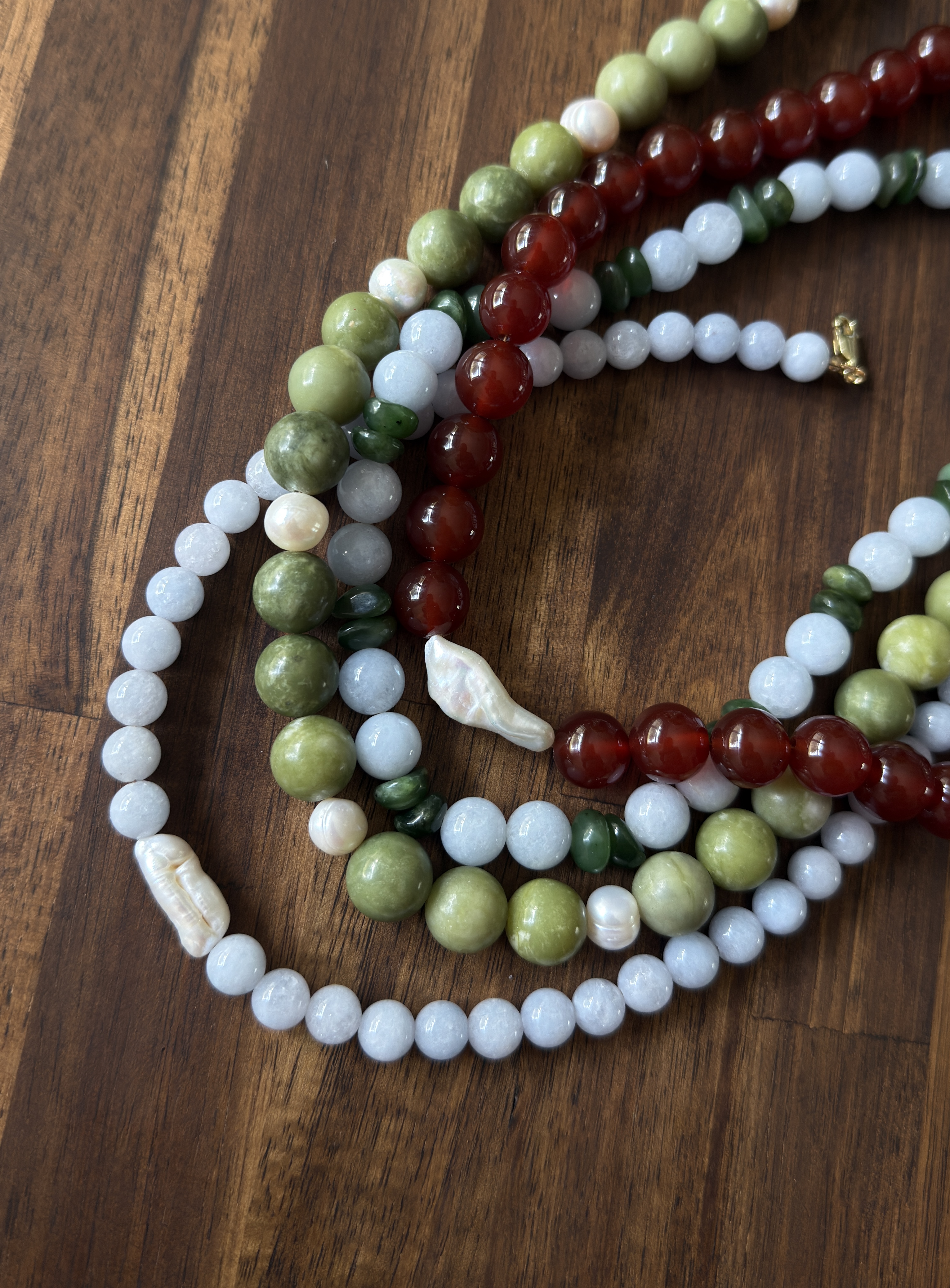 A collection of handmade gemstone necklaces